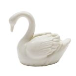 A Lowestoft model of a swan: in the white, naturalistically modelled with neck arched,