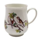 A Chelsea mug: of baluster shape with loop handle,