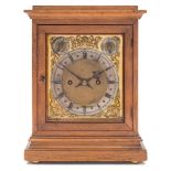Winterhalder and Hoffmeier, Germany, an oak mantel clock: the eight-day duration,