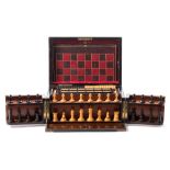 A 19th century rosewood games compendium: the rectangular box with lift-up lid and hinged front,