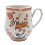 A First Period Worcester mug: of bell shape with ridged loop handle,