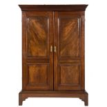 A mid 18th Century mahogany side cupboard on a low stand:,