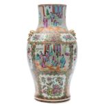 A Cantonese porcelain vase of baluster form: with gilt mask handles,