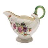 A First Period Worcester dolphin ewer creamboat: with green lamprey handle,