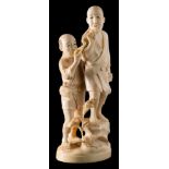 A Japanese carved ivory okimono: of two peasants smoking pipes, in traditional costume,