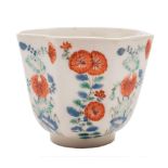 A Chelsea octagonal beaker: finely painted in the Kakiemon style with panels of flowering plants in
