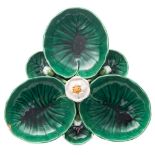 A Minton majolica 'triple lotus' sectional dish: modelled with central white and yellow bloom and