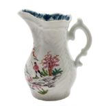 A First Period Worcester feather-moulded cream jug: with double scroll handle,