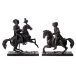 A 19th century patinated bronze study of a cavalier: mounted on a rearing horse,