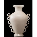 Attributed to Napoleone Martinuzzi (1892-1977) a pulegoso glass vase: the white body of footed