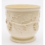 An early 19th Century Continental creamware wine cooler:, applied with encircling fruiting vines,
