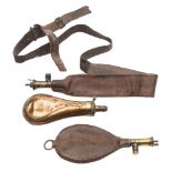 A group of three 19th Century shot and powder flasks: including a brass and copper shot flask,