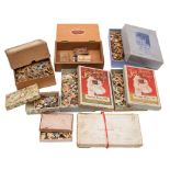 A group of seven woodbacked jigsaws: (some defective) and three safety match boxes,