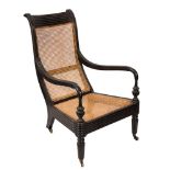 The Gladstone Chair - An early 19th Century Indo Colonial open armchair:,