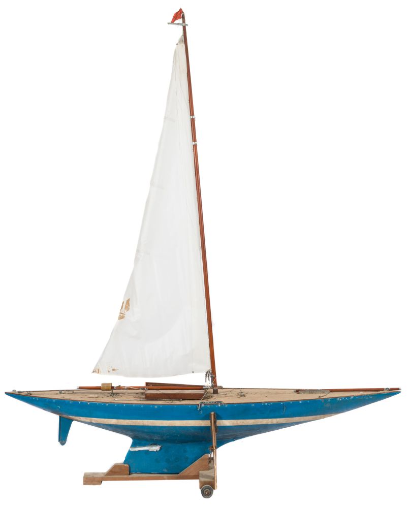 A radio control model pond yacht:, with simulated planked decks,