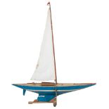 A radio control model pond yacht:, with simulated planked decks,