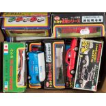 A collection of various Japanese diecast vehicles:, including Police and Fire service Toyota 4WD,