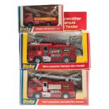 Two Dinky Merryweather Marquis Fire Tenders (285):, red and silver with 'Falck' stickers,