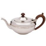 A George V silver teapot, maker Charles & Richard Comyns, London, 1922: of plain circular form,