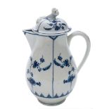 A Lowestoft blue and white milk jug and cover: of baluster form with flower bud finial and grooved