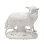 A Longton Hall 'Snowman' model of a ewe: standing with head turned to dexter,