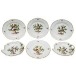 A pair of Meissen ornithological leaf-shaped dessert dishes and four matching plates: ozier-moulded