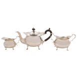 An Edward VII matched silver three-piece bachelor's tea service, maker Walker & Hall, Sheffield,