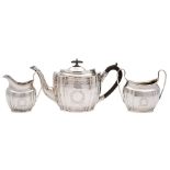 A George V silver three-piece tea service, maker S Blanckensee & Son Ltd, Birmingham,