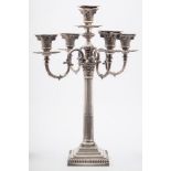 A silver plated five-light Corinthian column candelabra: with foliate capital nozzles on four