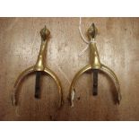 A pair of George III brass and steel spurs:,