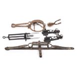 A group of five various steel and iron traps including a man trap and a mole trap:,