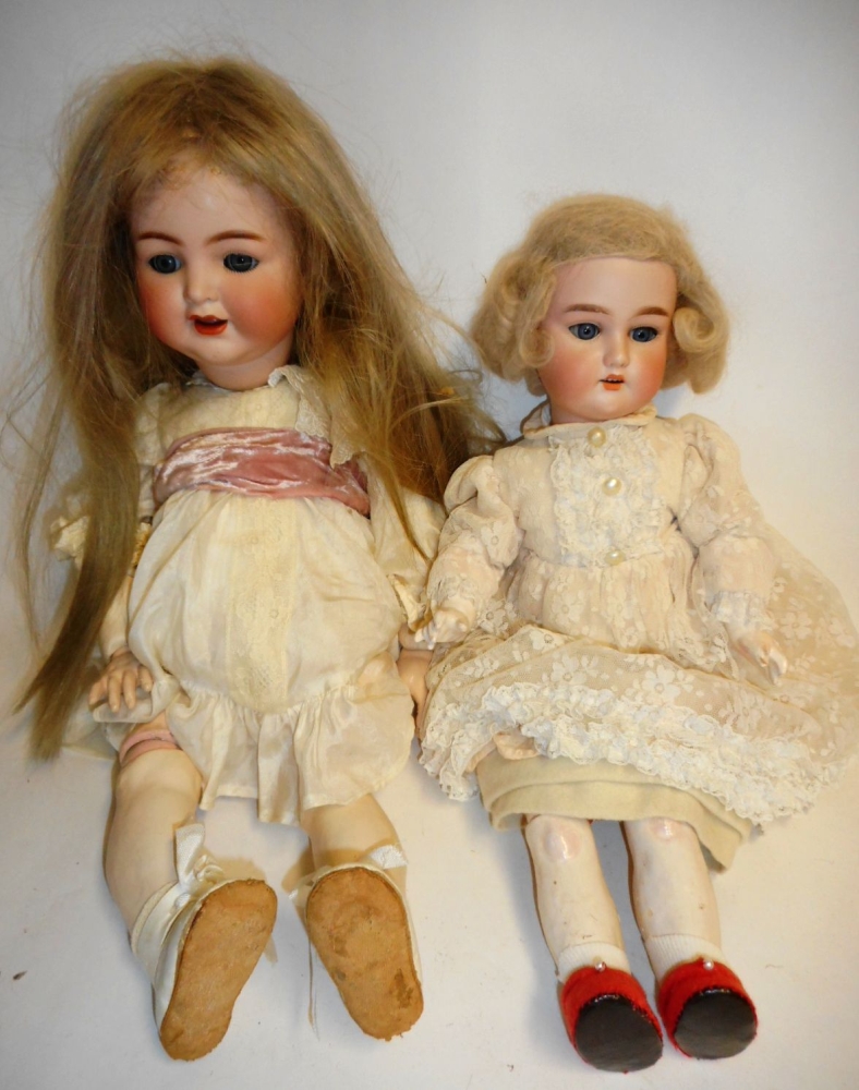 WITHDRAWN - DUPLICATE OF LOT 528 A German bisque head doll: impressed Germany .200.