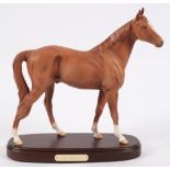 A Royal Doulton model of a racehorse 'The Minstrel':, on a wooden plinth, 35cm high.