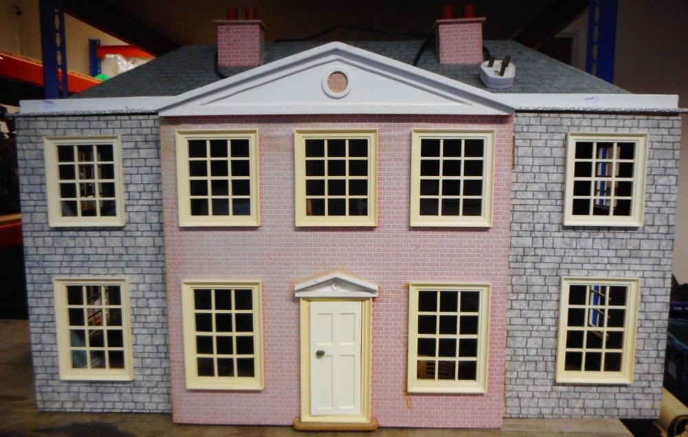 A 20th century doll's house: with double hinged front enclosing hallway, staircase and six rooms,