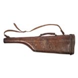 A brown leather leg o'mutton gun case:, unsigned (hard shell).