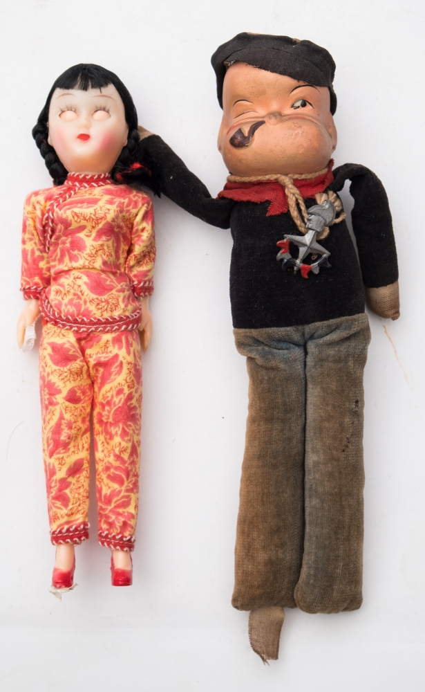 A Continental composition Popeye doll and a celluloid doll of an East Asian girl:,