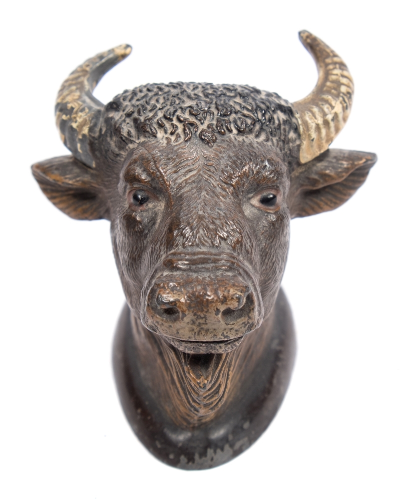 A late 19th/early 20th century cold painted spelter Bull's head vesta:, 8cm high.