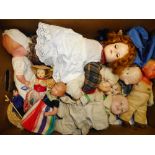 A collection of assorted celluloid, plastic and composition dolls,: various makers.
