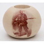 A James Macintyre pottery match holder: of globular form printed in sepia with 'A gentleman in