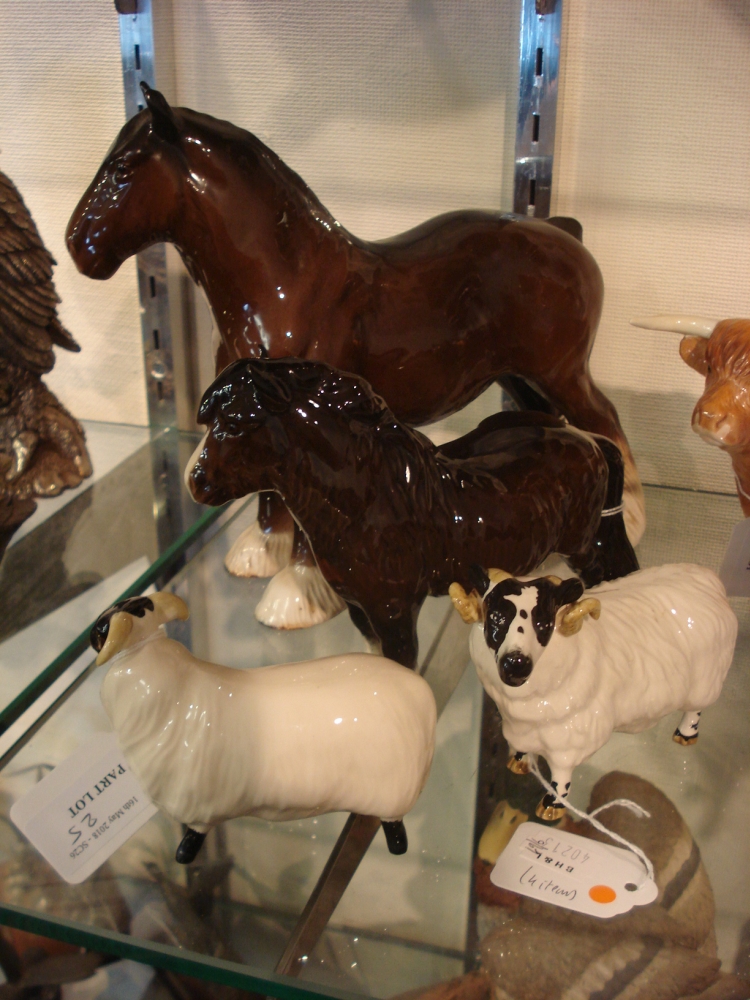 A Beswick model of a Shire Horse, together with a Dartmoor Pony and two sheep:.