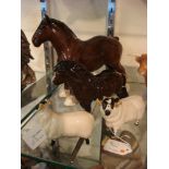 A Beswick model of a Shire Horse, together with a Dartmoor Pony and two sheep:.