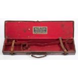 A brown leather shotgun case by William Evans, London:,