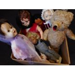 A collection of assorted dolls : including a Sasha girl doll dressed in corduroy blouse and denim