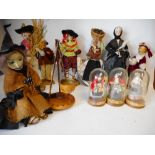 A box of assorted dolls: includes a seated witch by her cauldron,