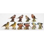 A group of ten Beswick porcelain models of birds:, including 'Goldfinch', 'Greenfinch',