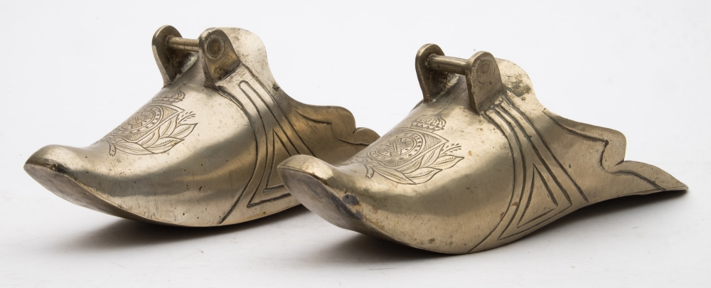 A pair of Spanish battle stirrups:, of typical form with squared toes,