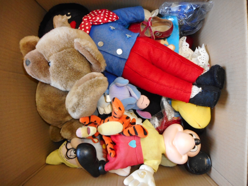 A collection of soft toys: including a golly, Disney characters, bears etc.