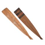 A pair of rowing oars with remains of honours to blades: (2)