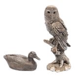 A filled silver model of a Barn Owl:, 21cm high,