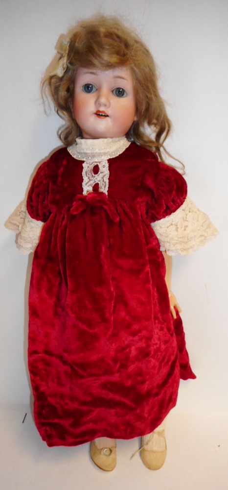 A German bisque head doll: impressed Germany .200.